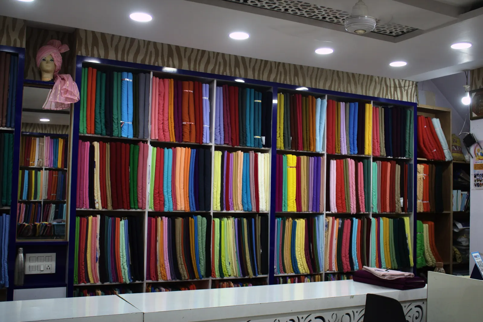 Colourful turban fabrics displayed in the Sahney Pagri House store